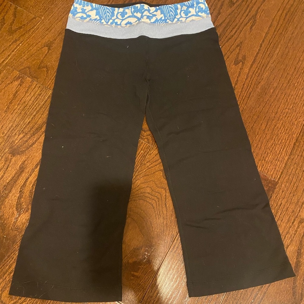 Lululemon size 4, black flared capris with blue band with pattern
